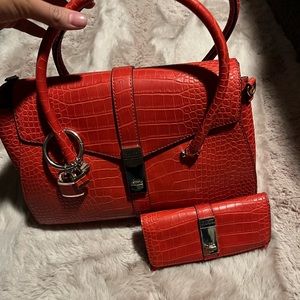 Red Guess purse with matching wallet. Gently used